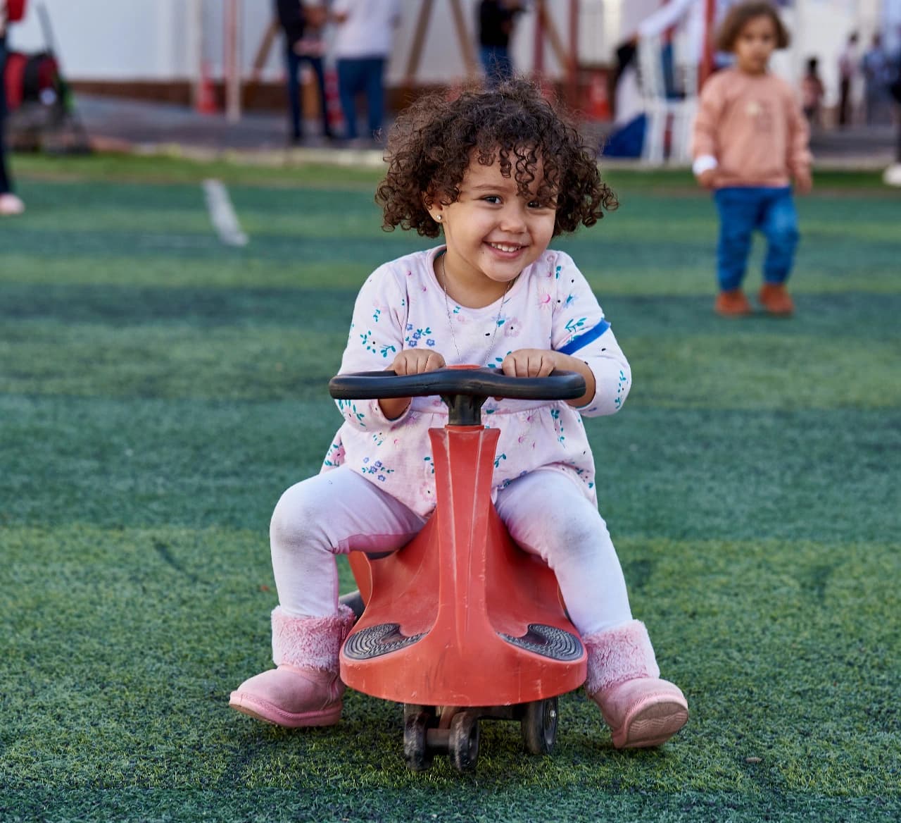 A child playing in a safe, caring home